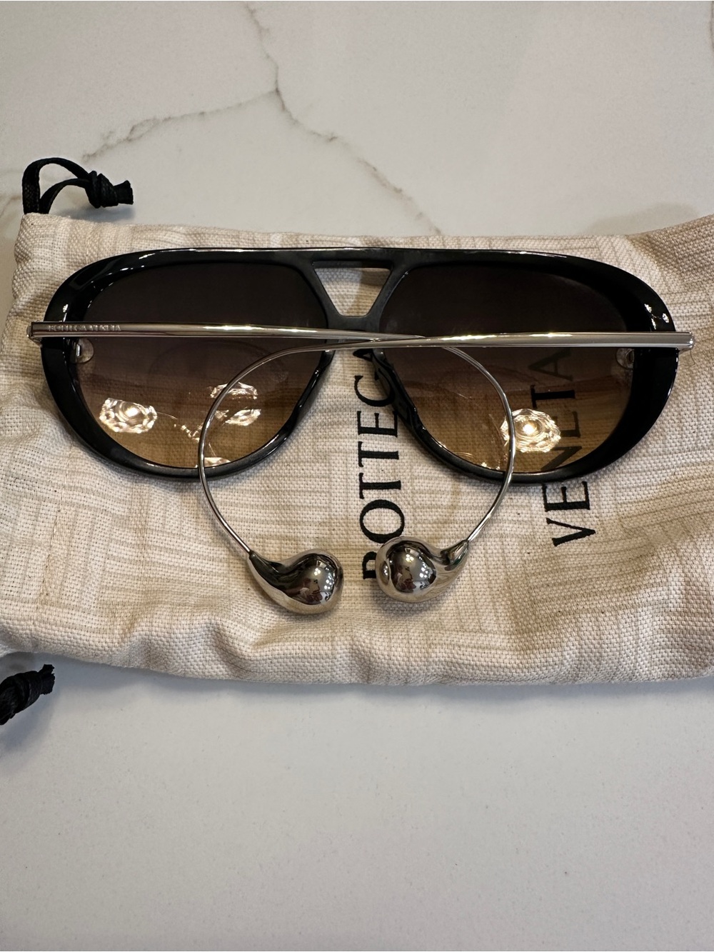 Bottega Veneta Black Sunglasses with Silver Metal Accents